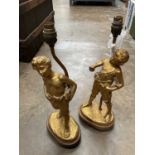 Pair of French gilded lamps, signed