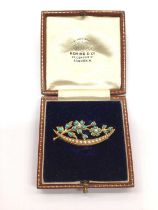 Victorian gold seed pearl and turquoise brooch with floral and crescent design