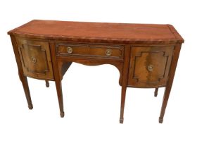 Late 19th/early 20th century mahogany bow front sideboard, with frieze drawer flanked by twin cupboa