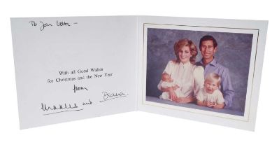 T.R.H. The Prince and Princess of Wales, signed 1984 Christmas card, with twin gilt ciphers to cover