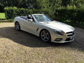 2013 Mercedes SL500 convertible with AMG performance pack ( uprated brakes, wheels and body kit from