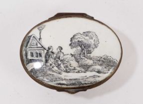 An enamel oval box, printed with figures in a landscape, circa 1770