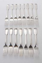 Twelve Victorian silver Fiddle pattern dessert forks, some with engraved initials