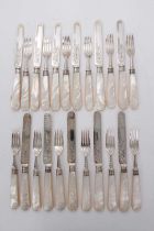 Set Edwardian mother of pearl handled fruit knives and forks, eleven pairs plus one fork