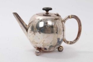 Plain Victorian silver bullet-shaped teapot with loop handle with ivory insulators raised on ball fe