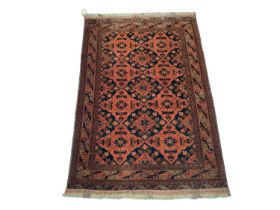 Afghan rug, with geometric foliate ornament on claret ground, 200 x 131cm