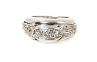 White gold and diamond ring with a wide tapered band