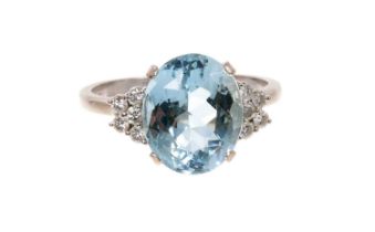 Aquamarine and diamond ring with an oval mixed cut aquamarine measuring approximately 13mm x 10.7mm