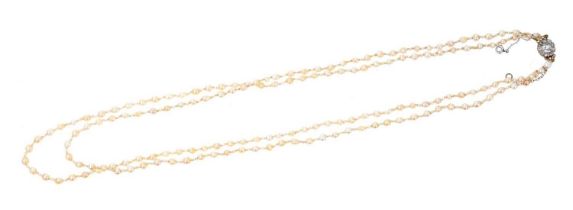 Antique pearl necklace with a double strand of pearls measuring approximately 2.5mm - 3.7mm on an an