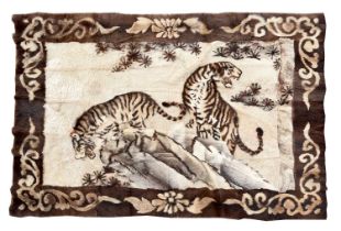 Impressive hand stitched fur rug depicting a pair of tigers on a rock, 160cm x 220cm