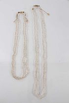 Antique seed pearl two-strand necklace on a gold clasp, 42cm, together with a long string of seed pe