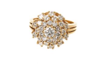 Diamond cluster ring with a tiered cluster of brilliant cut diamonds in 18ct yellow gold setting