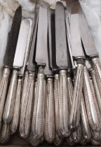 Collection of 26 Victorian silver handled knives with bead edge and ten other knives