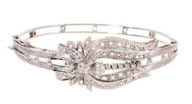 White gold and diamond hinged bangle with rose cut and single cut diamonds in illusion setting