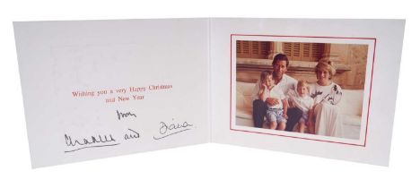 T.R.H. The Prince and Princess of Wales, signed 1987 Christmas card, with twin gilt ciphers to cover