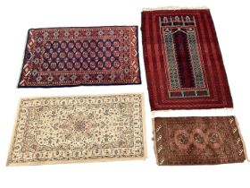 Belouche prayer rug, geometric ornament on claret ground, 156 x 103cm, and three further small moder