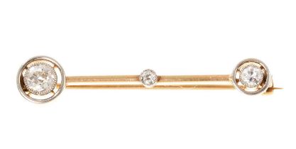 Edwardian diamond comet with three old cut diamonds in platinum setting on a gold bar, estimated tot