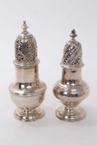 George II silver caster of baluster form with pierced slip in cover, (London 1741), together with an