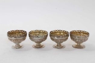 Set of four silver salts of urn form.