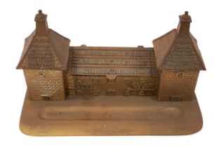 Unusual Victorian brass advertising desk stand, in the form of maltings, with hinged roofs, made for