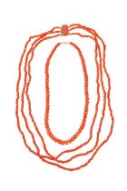 19th century coral bead necklace with a triple strand of coral beads on a gilt metal and carved cora