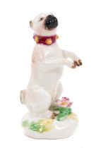 A Bow model of a begging pug dog, c. 1758, on circular mound base with applied flower and green leav