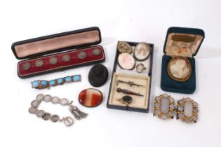 Group of antique jewellery in a leather case