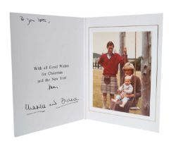 T.R.H. The Prince and Princess of Wales, signed 1983 Christmas card, with twin gilt ciphers to cover