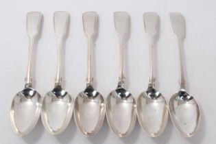 Five Victorian silver Fiddle and Thread pattern table spoons with engraved armorial crest