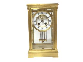 Late 19th century French four glass gilt brass mantel clock