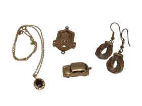 9ct gold fob, 9ct gold Mini car charm, 9ct gold garnet pendant on 9ct gold chain and pair of three c