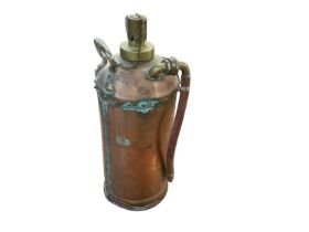 Vintage copper fire extinguisher stamped 23502 near base, approximately 50cm in height.
