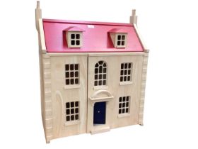 Contemporary children's dolls house together with a contemporary miniature pine dresser and two ches