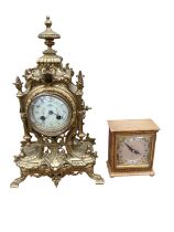 Ornate Victorian brass mantel clock with painted enamel dial together with small oak cased mantel cl