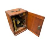 Late 19th / early 20th century mahogany cased microscope