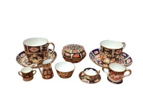 Selection of Royal Crown Derby Imari pattern china including two cups and saucers, lidded pot, minia