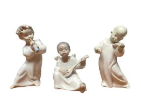 Six small Lladro porcelain angels, some playing musical instruments