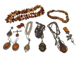 Group of silver mounted amber jewellery, together with an amber bead necklace and bracelet