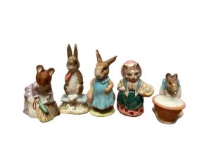 Eleven Beswick Beatrix Potter figures and a Country Artists Otter group