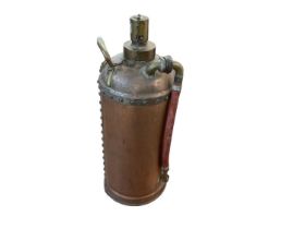 Vintage copper fire extinguisher stamped 30450 near base, approximately 50cm in height.