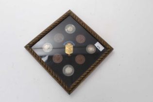 G.B. - A framed collection of late 19th century silver and copper medallions