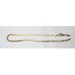 A marked 750 yellow metal fancy flat-link neck chain with sprung clasp