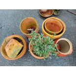A selection of terracotta and other garden pots - various condition