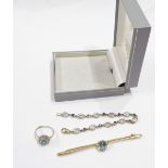 A part harlequin suite of aquamarine set jewellery comprising a yellow metal bar brooch, marked