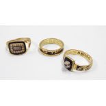 Three antique mourning rings all with black enamel detailing, comprising an 1833 18ct, gold tiny