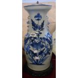 A 19th Century Chinese porcelain vase of baluster shape with applied dog form handles and blue