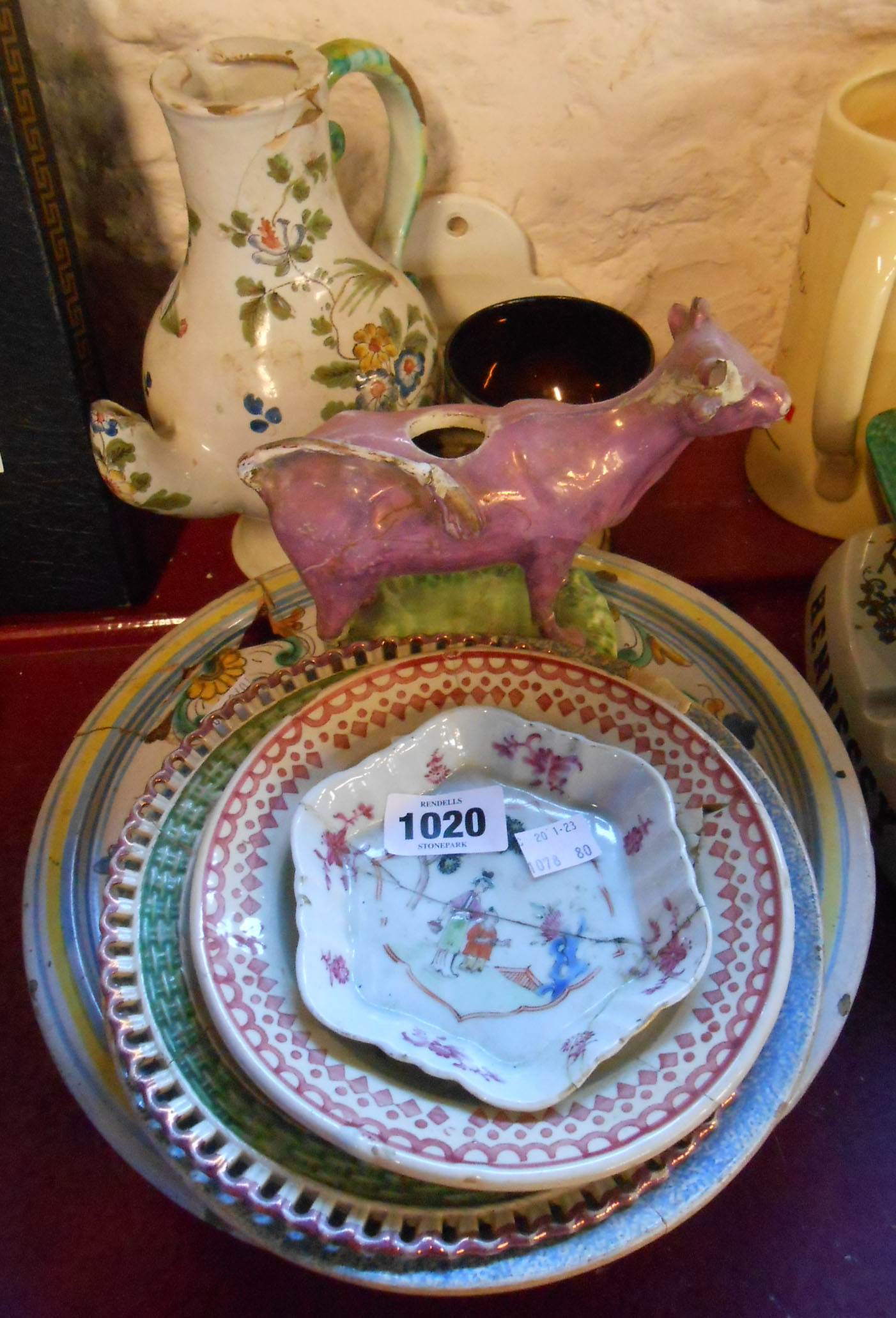 A selection of assorted ceramic items including Dillwyn Swansea purple lustre decorated ribbon