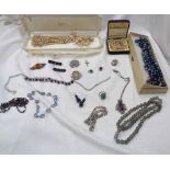 A tub containing costume and other jewellery including silver part watch chain and Victorian