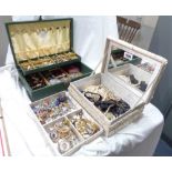 A mother-of-pearl clad jewellery box and a concertina action similar, both containing a large