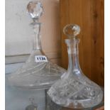 A cut glass ship's style decanter - sold with a smaller similar